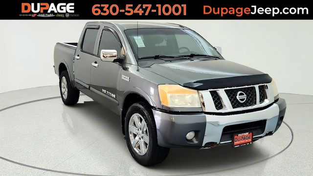 Silver (Smoke Metallic) 2010 Nissan Titan Pickup Truck Four-Wheel Drive 5-Speed Automatic