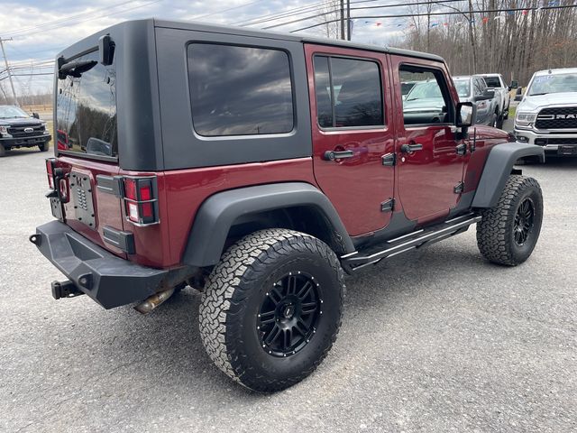 2008 Jeep Wrangler Unlimited X - Red Rock Crystal Pearlcoat exterior view 2