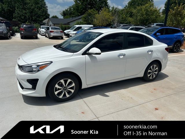 Clear White 2023 Kia Rio Sedan Front-Wheel Drive Continuously Variable Transmission