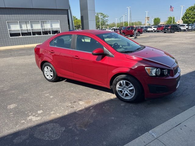 Crystal Red Tintcoat 2015 Chevrolet Sonic LT Sedan FWD Sedan Front-Wheel Drive 6-Speed Automatic