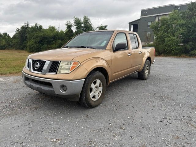 Desert Gold Metallic 2005 Nissan Frontier Pickup Truck Rear-Wheel Drive 6-Speed Manual Overdrive