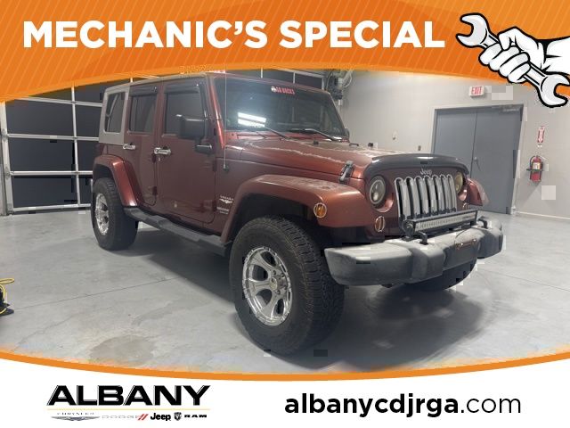 Red Rock Crystal Pearlcoat 2007 Jeep Wrangler Unlimited Sahara RWD SUV / Crossover Rear-Wheel Drive 4-Speed Automatic