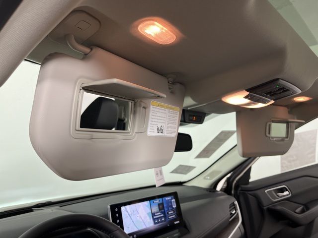 2025 Champagne Silver Metallic/Super Black Nissan Rogue Platinum FWD SUV