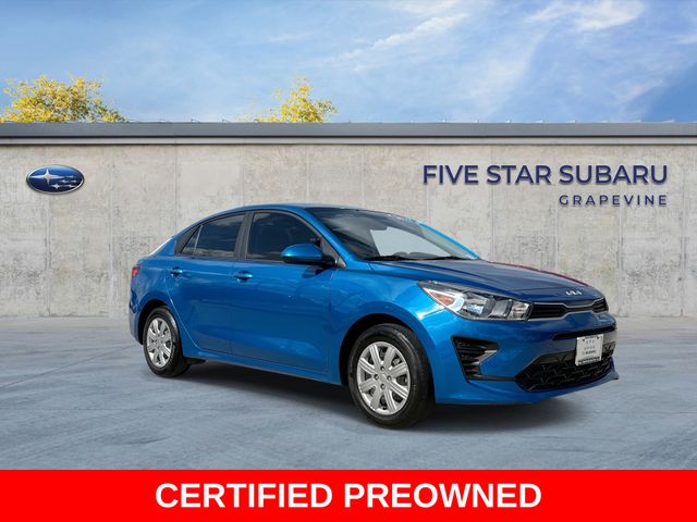 Sporty Blue 2023 Kia Rio S FWD Sedan Front-Wheel Drive Continuously Variable Transmission