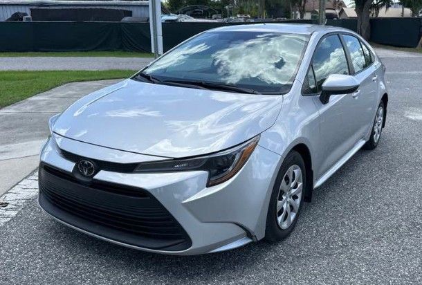 Classic Silver Metallic 2024 Toyota Corolla LE FWD Sedan Front-Wheel Drive Continuously Variable Transmission