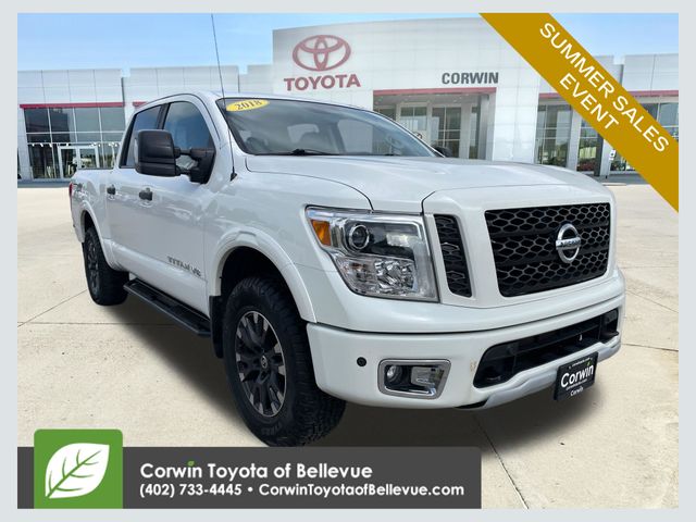 Pearl White Metallic 2018 Nissan Titan Pickup Truck Four-Wheel Drive 7-Speed Automatic