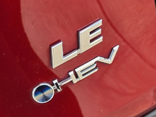 2025 Toyota RAV4 Hybrid LE Red at Classic Elite Chevrolet Sugar Land