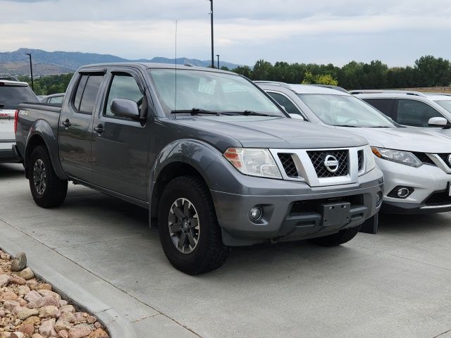 Gray (Gun Metallic) 2016 Nissan Frontier Pickup Truck Four-Wheel Drive 5-Speed Automatic Overdrive