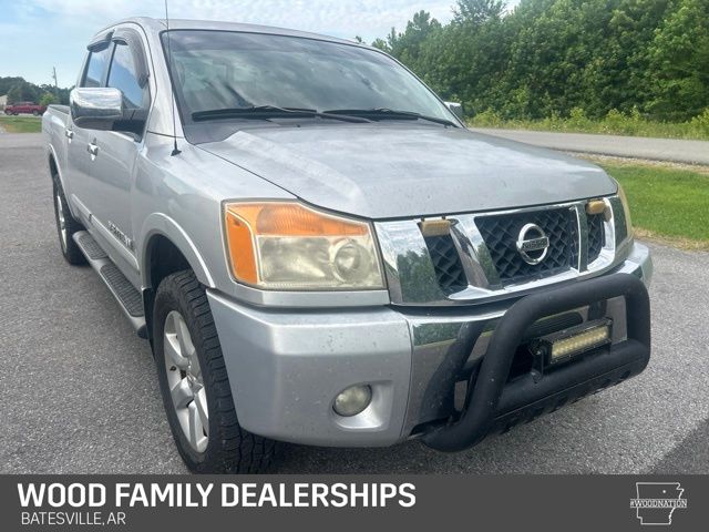 Silver Lightning Metallic 2010 Nissan Titan Pickup Truck Four-Wheel Drive 5-Speed Automatic