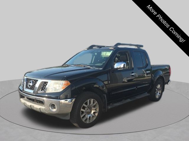 Super Black Metallic 2010 Nissan Frontier Pickup Truck Four-Wheel Drive 5-Speed Automatic Overdrive