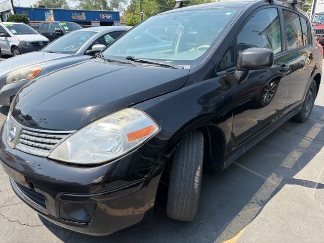 Brown (Espresso Black Metallic) 2011 Nissan Versa Hatchback Front-Wheel Drive 4-Speed Automatic