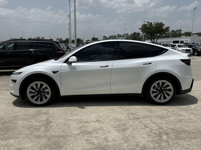 2026 Tesla Model Y Long Range White at AutoSavvy Houston Northwest