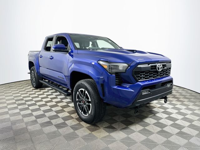 Blue 2024 Toyota Tacoma Pickup Truck Four-Wheel Drive 6-Speed Manual