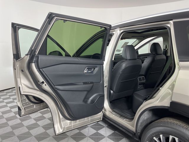 2025 Champagne Silver Metallic/Super Black Nissan Rogue Platinum FWD SUV