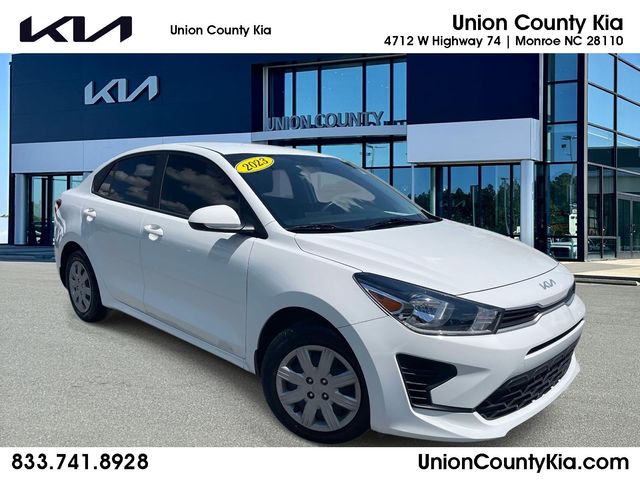 Clear White 2023 Kia Rio Sedan Front-Wheel Drive Continuously Variable Transmission