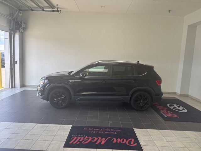 2023 Volkswagen Taos 1.5T SE Black at DeMontrond Auto Country