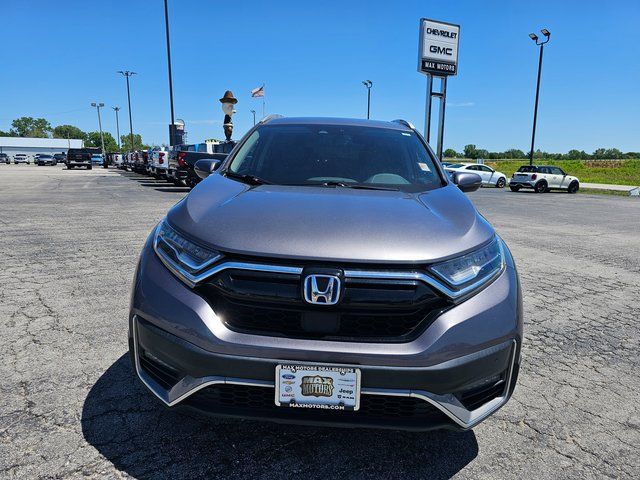 Used 2021 Honda CR-V Hybrid Touring with VIN 7FART6H9XME021230 for sale in Kansas City