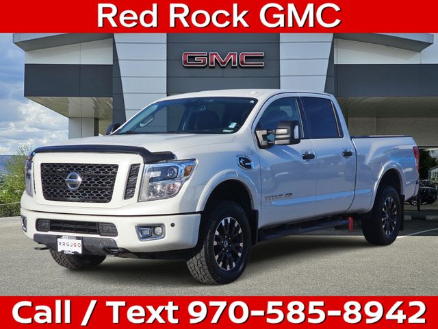 Pearl White 2019 Nissan Titan Pickup Truck Four-Wheel Drive 6-Speed Automatic