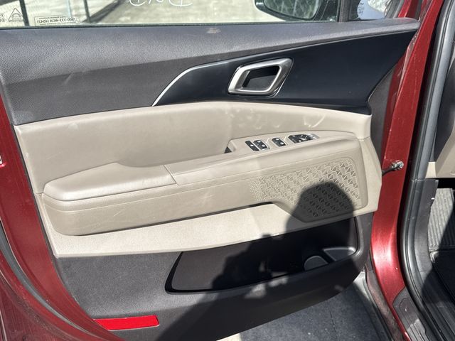 2025 Kia Carnival LXS Red at Shottenkirk Kia Fort Bend