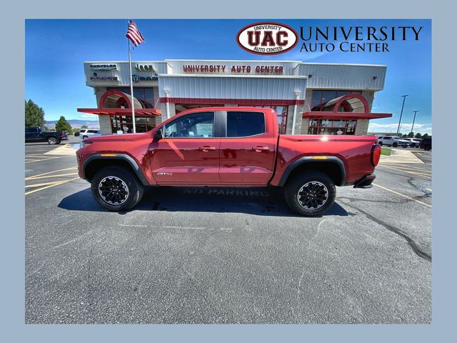 Volcanic Red Tintcoat 2026 GMC Canyon Pickup Truck Four-Wheel Drive 8-Speed Automatic