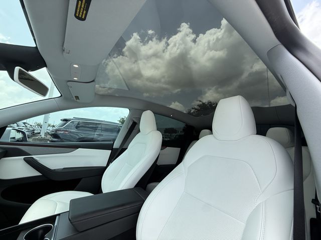 2026 Tesla Model Y Long Range White at AutoSavvy Houston Northwest