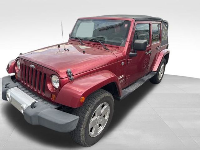Deep Cherry Red Crystal Pearlcoat 2011 Jeep Wrangler Unlimited Sahara 4WD SUV / Crossover Four-Wheel Drive 6-Speed Manual