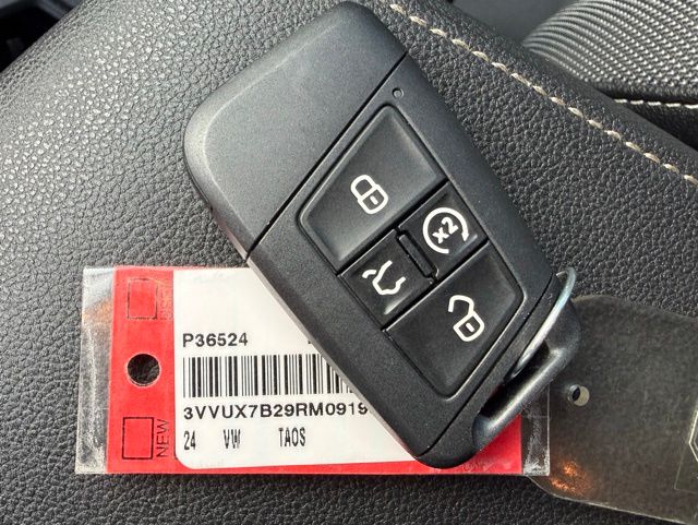 used 2024 Volkswagen Taos car, priced at $23,220