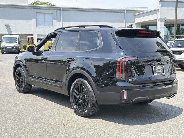Used 2025 Black Kia EX X-Line image 11