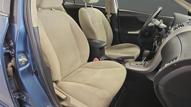 Used 2013 Tropical Sea Metallic Toyota LE image 23