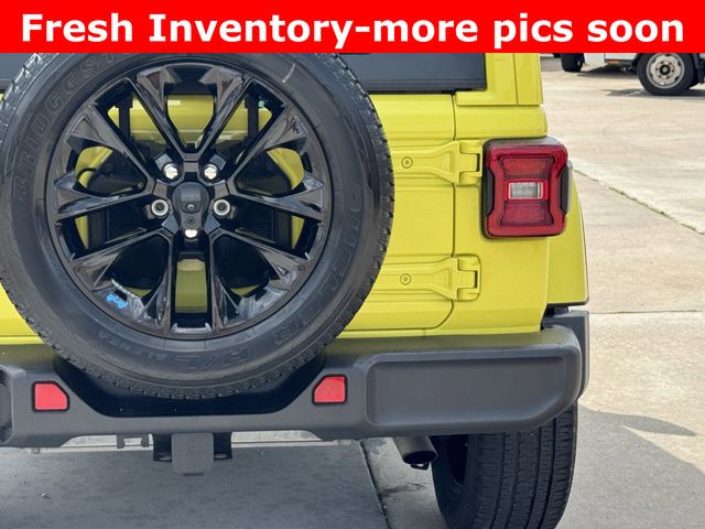 2023 Jeep Wrangler Sahara 4xe Yellow at DeMontrond Gulf Freeway