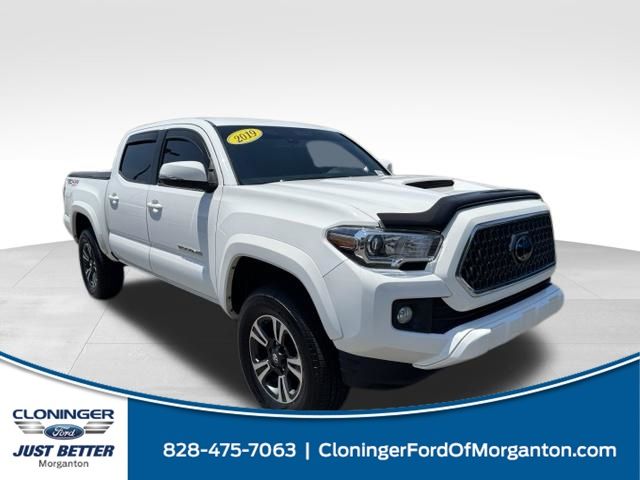 Super White 2019 Toyota Tacoma Pickup Truck Four-Wheel Drive 6-Speed Manual