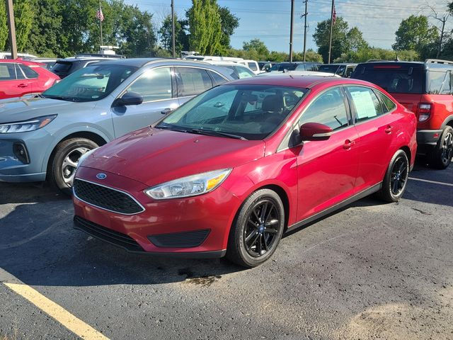 Ruby Red Metallic 2015 Ford Focus Sedan Front-Wheel Drive 6-Speed Automatic