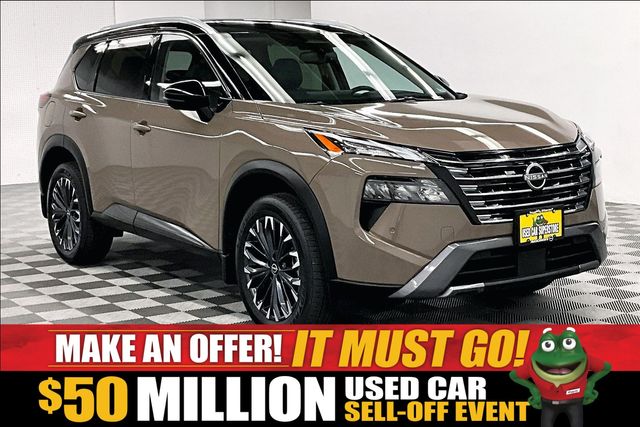 Baja Storm Metallic/Super Black 2025 Nissan Rogue SUV / Crossover All-Wheel Drive Continuously Variable Transmission