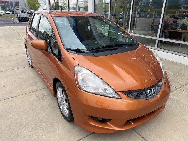 Orange Revolution Metallic 2011 Honda Fit Sport Hatchback Front-Wheel Drive 5-Speed Automatic