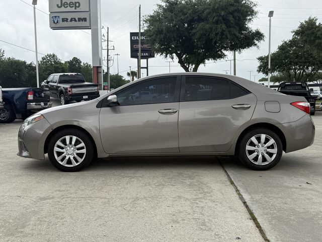 2015 Toyota Corolla LE Brown at Texan Dodge Chrysler Jeep Ram