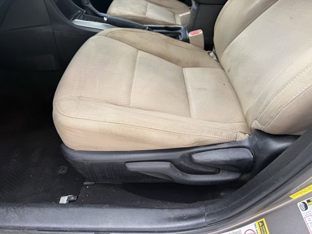 2015 Toyota Corolla LE Brown at Texan Dodge Chrysler Jeep Ram