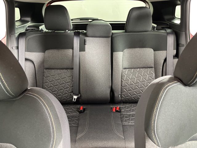 2025 Scarlet Ember Tintcoat/Super Black Nissan Kicks SV FWD SUV