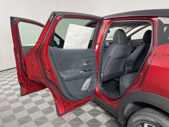 2025 Scarlet Ember Tintcoat/Super Black Nissan Kicks SV FWD SUV