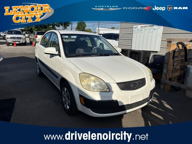 White 2009 Kia Rio Sedan Front-Wheel Drive 4-Speed Automatic Overdrive