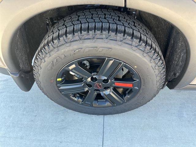 2025 Baja Storm Metallic Nissan Rogue Rock Creek AWD SUV