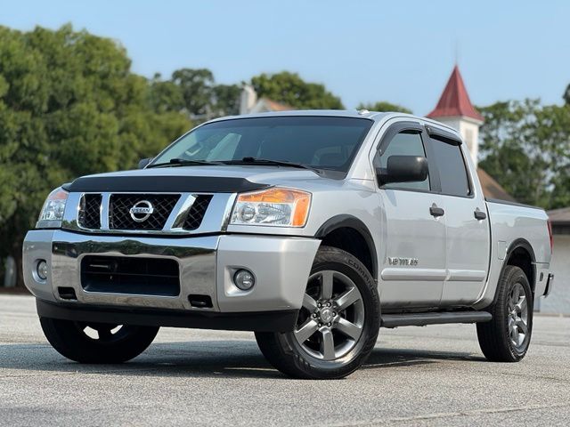 Brilliant Silver 2015 Nissan Titan Pickup Truck Four-Wheel Drive 5-Speed Automatic