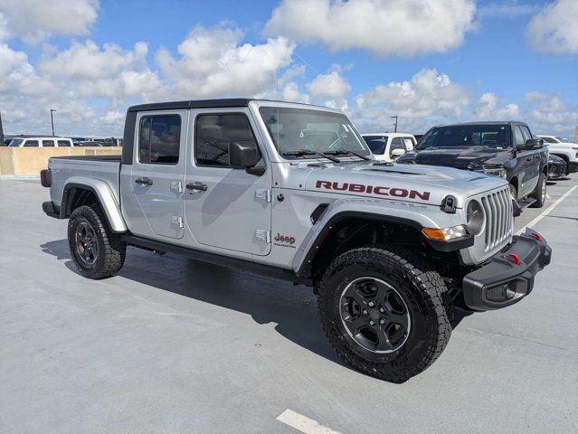 Silver 2023 Jeep Gladiator Pickup Truck Four-Wheel Drive 8-Speed Automatic