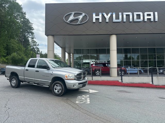 Bright Silver Metallic Clearcoat 2006 Dodge RAM 2500 Laramie Quad Cab 4WD Pickup Truck Four-Wheel Drive 4-Speed Automatic