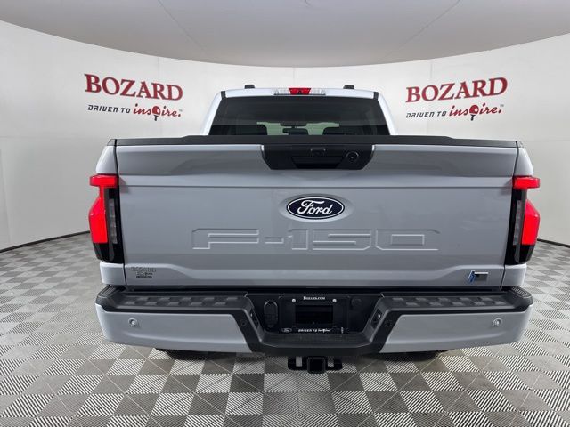 2025 Space White Metallic Ford F-150 Lightning Flash AWD Truck