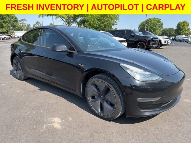 Solid Black 2018 Tesla Model 3 Mid Range RWD Sedan Rear-Wheel Drive 1-Speed Automatic
