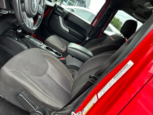 Used 2014 Red Jeep Unlimited Sahara image 19
