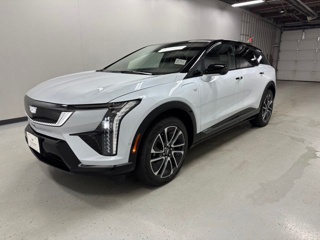 Vibrant White Tricoat 2026 Cadillac OPTIQ Premium Sport AWD SUV / Crossover All-Wheel Drive 1-Speed Automatic