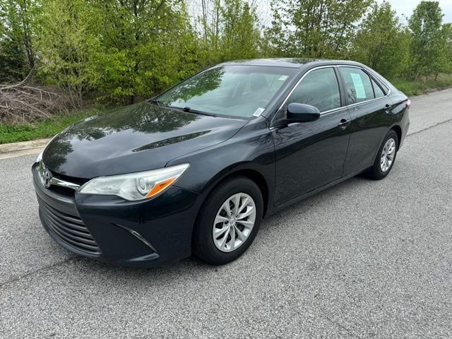 Attitude Black 2015 Toyota Camry LE Sedan Front-Wheel Drive 6-Speed Automatic
