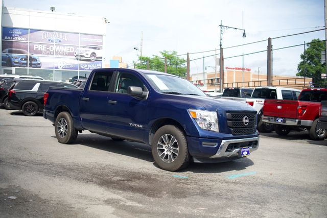 Deep Blue Pearl 2023 Nissan Titan Pickup Truck Four-Wheel Drive 9-Speed Automatic