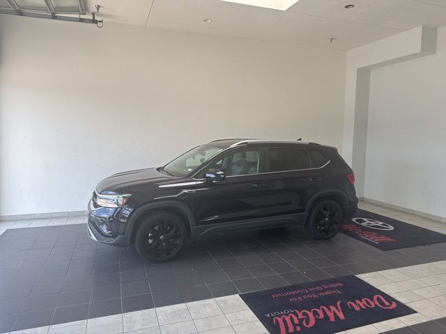 2023 Volkswagen Taos 1.5T SE Black at DeMontrond Auto Country